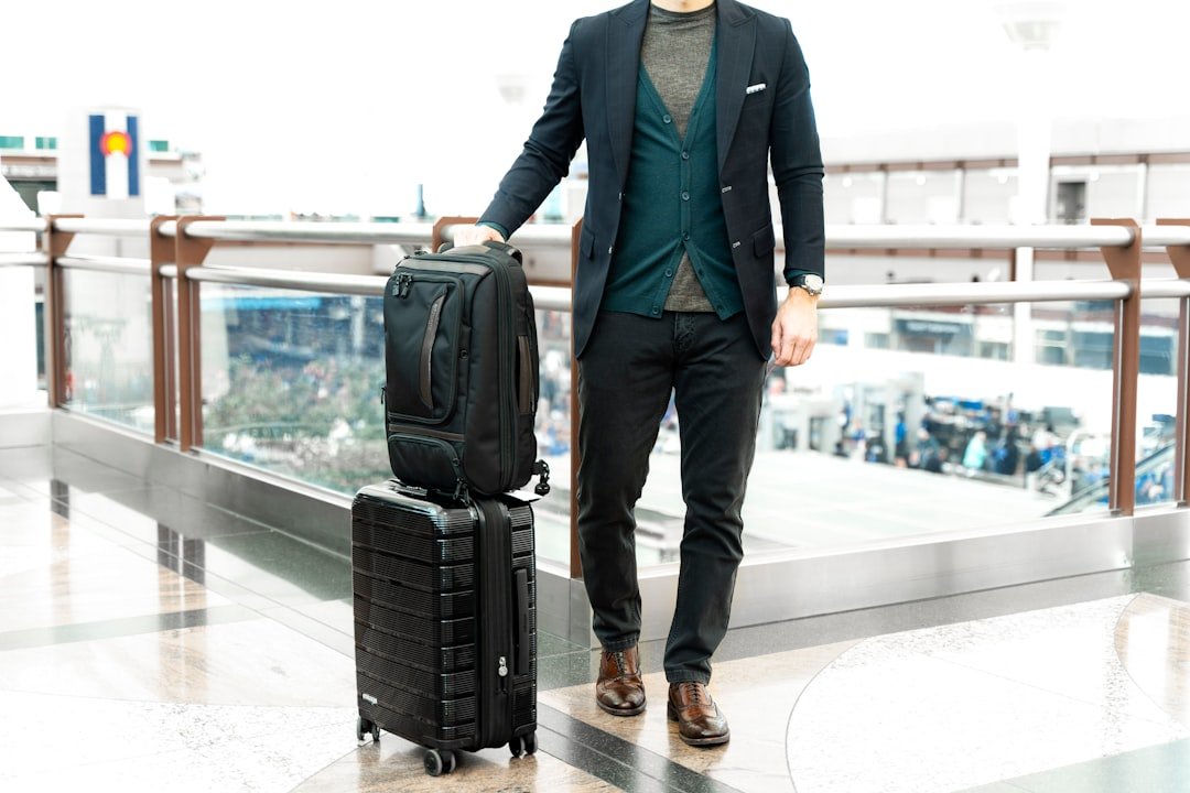 Business traveler with carry on luggage