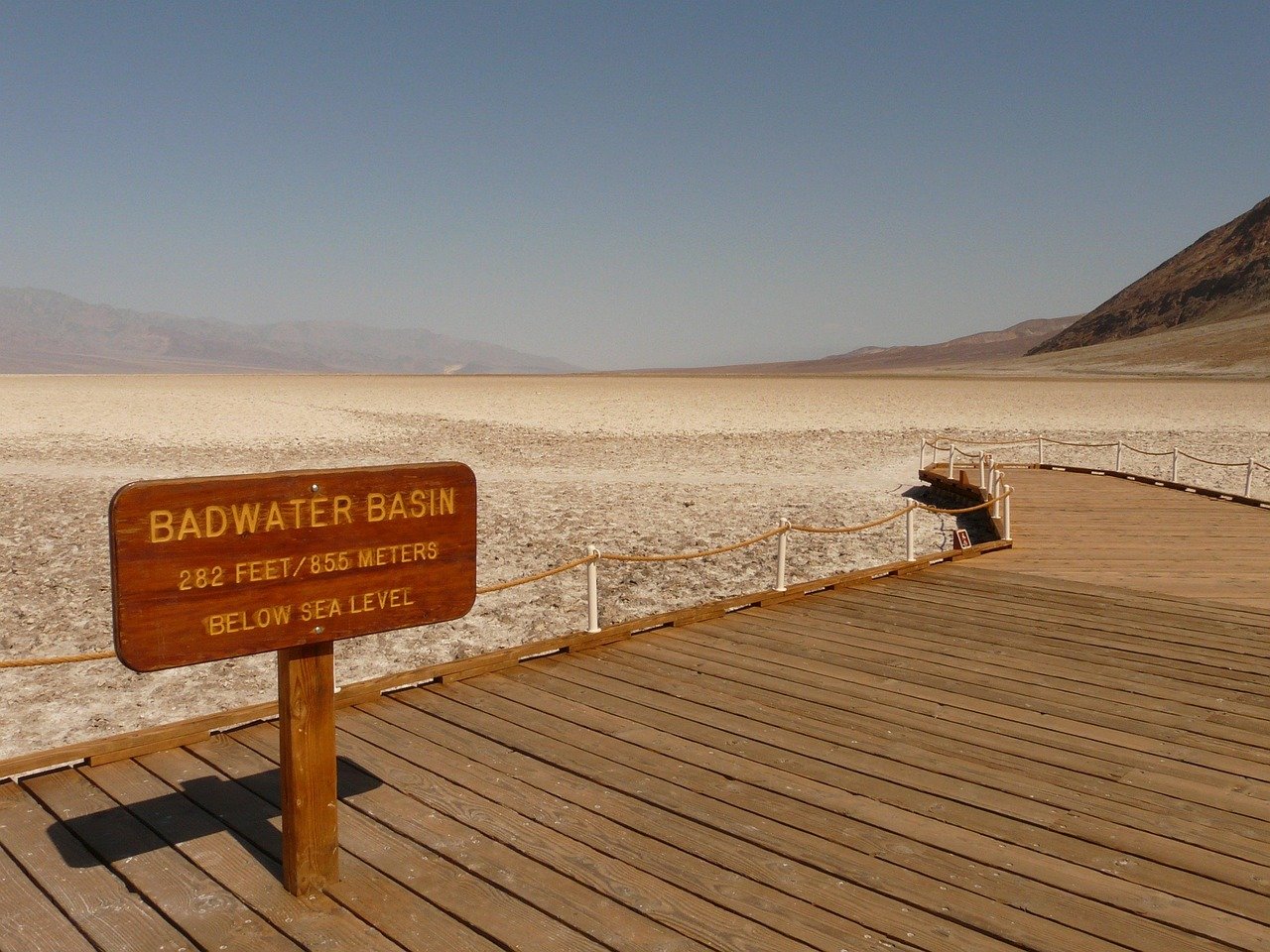 Death Valley Badwater Basin salt flats with wildflowers