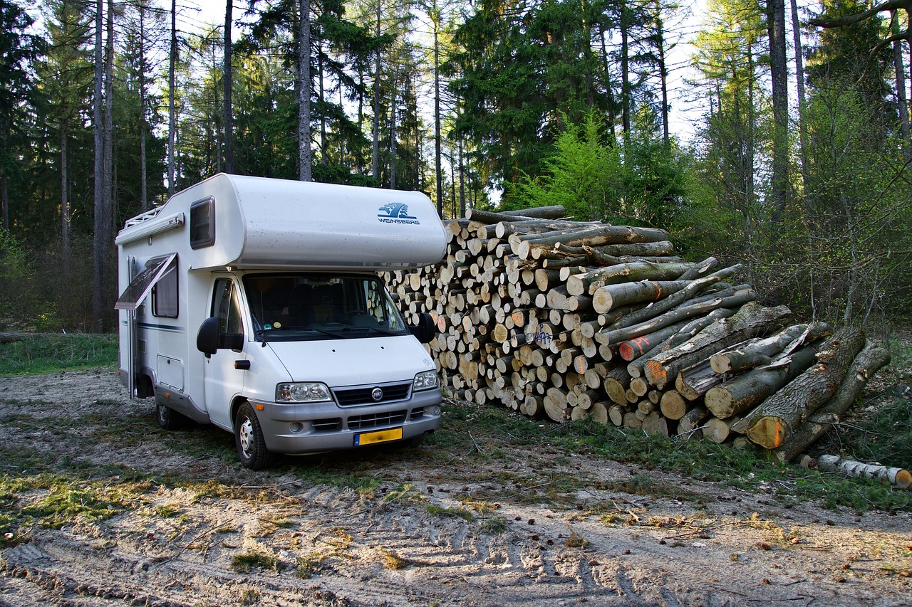 Campervan coastal beach camping showing van parked at scenic beachside location