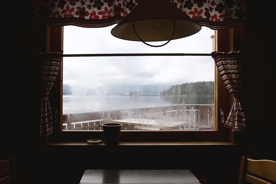 Camper van interior with window view showing natural light and scenic surroundings