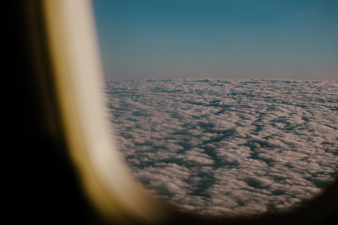 Airplane window view with comfortable seating