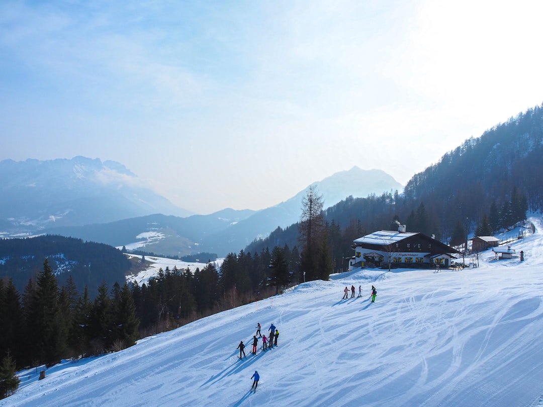 Mountain landscape with snow-capped peaks and blue sky
