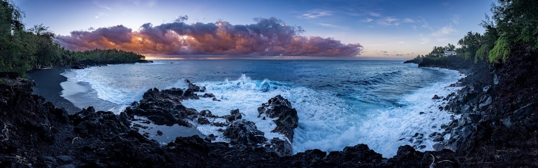 Hawaii black sand beach ocean waves