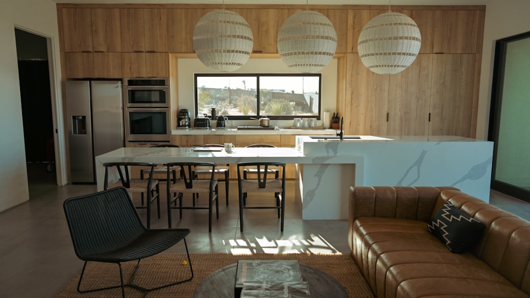 Camper van kitchen living space showing comfortable interior design with windows