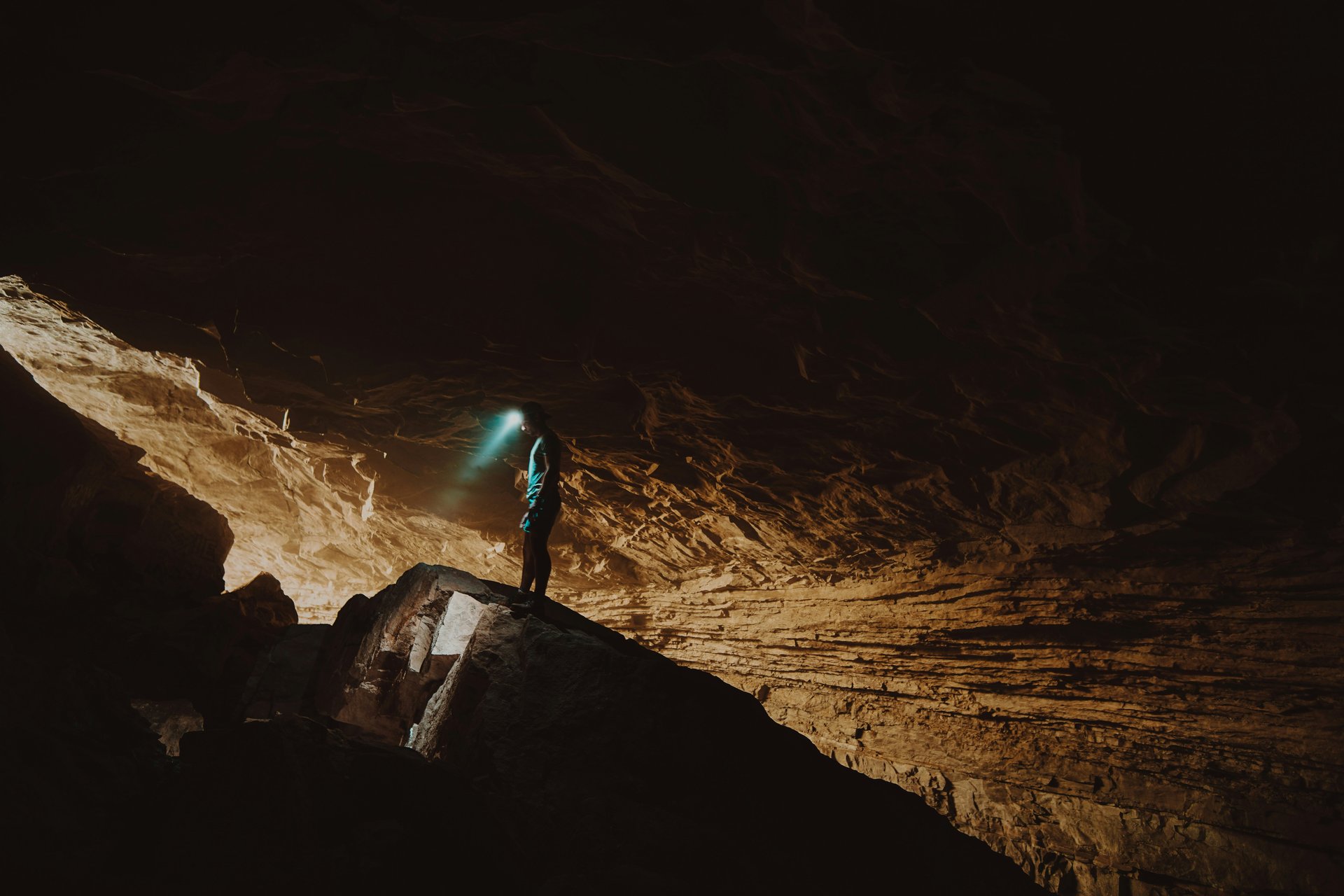 Hiking with headlamp in cave