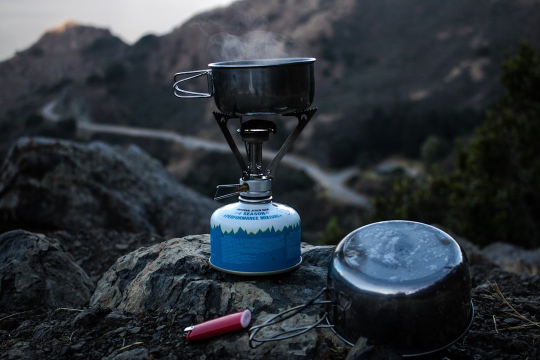 Camping stove with cookware and pots