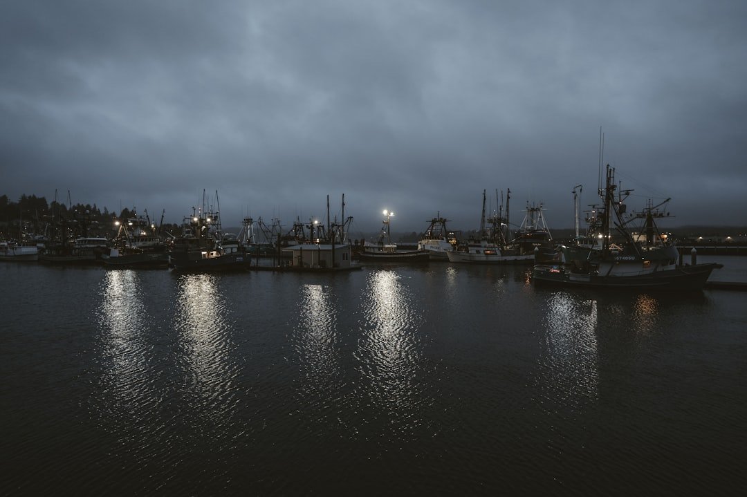 Newport Oregon fishing boats and bayfront at sunset
