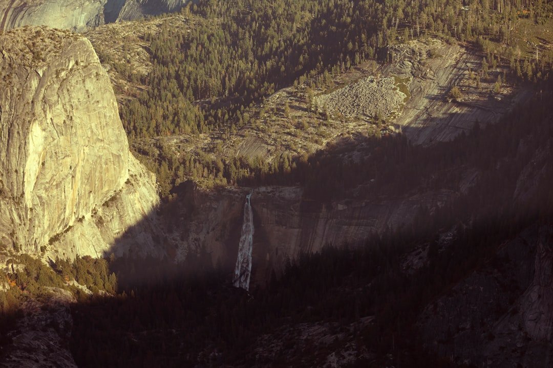 Waterfall spray on granite cliff face