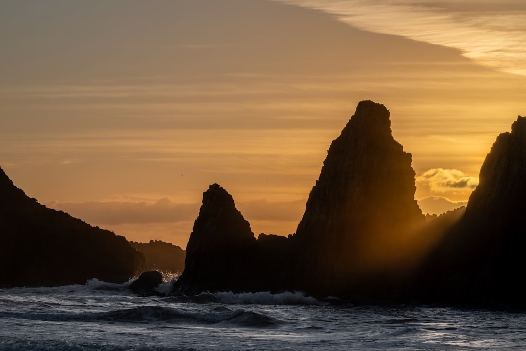 Oregon coast sea stacks and sunset ocean waves