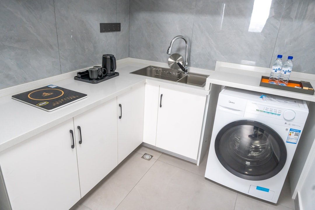 Hand washing clothes in hotel sink