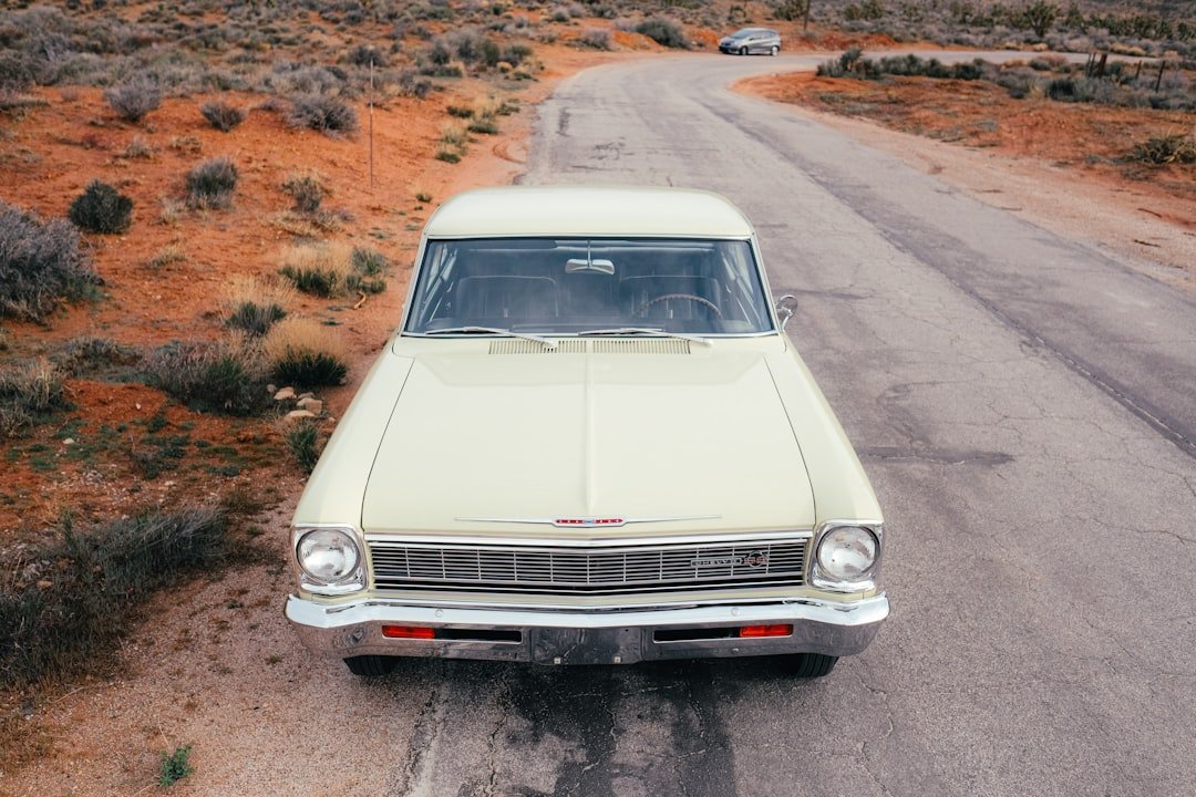 Vintage American car on an open road, perfect for Route 66