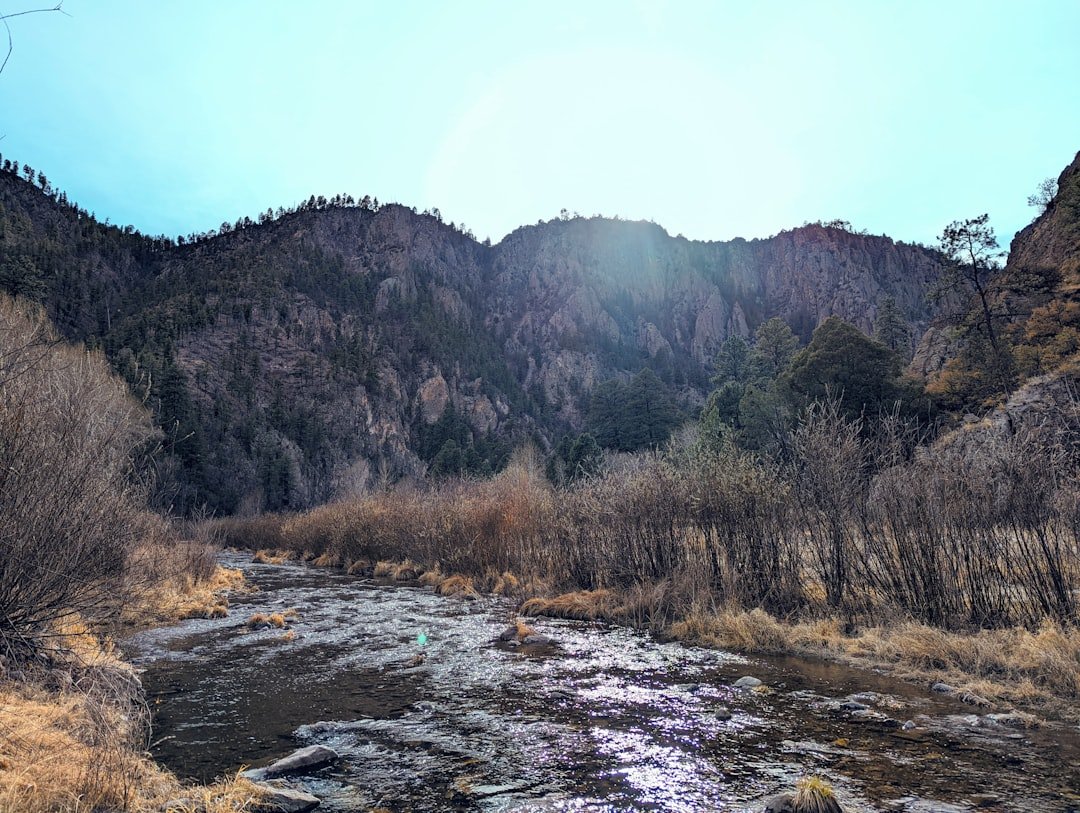 River valley sunset over canyon walls