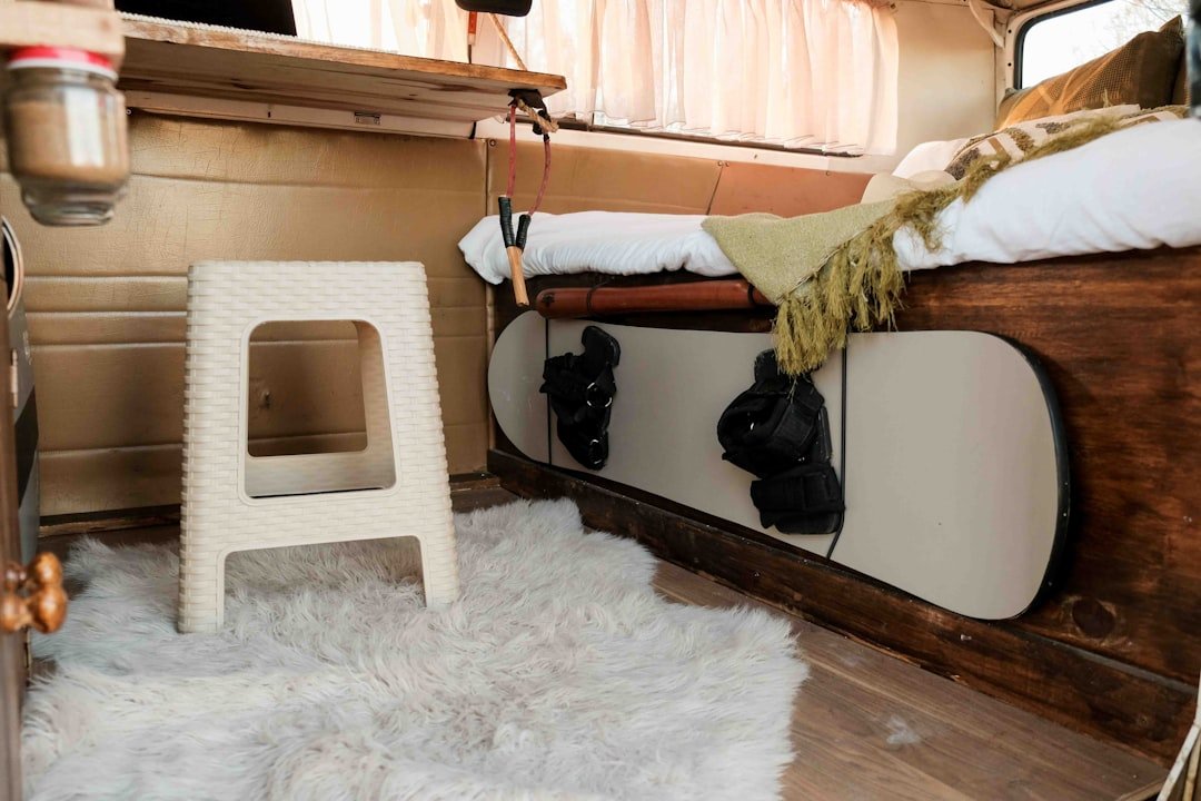 Campervan interior with bed and storage showing comfortable van life setup