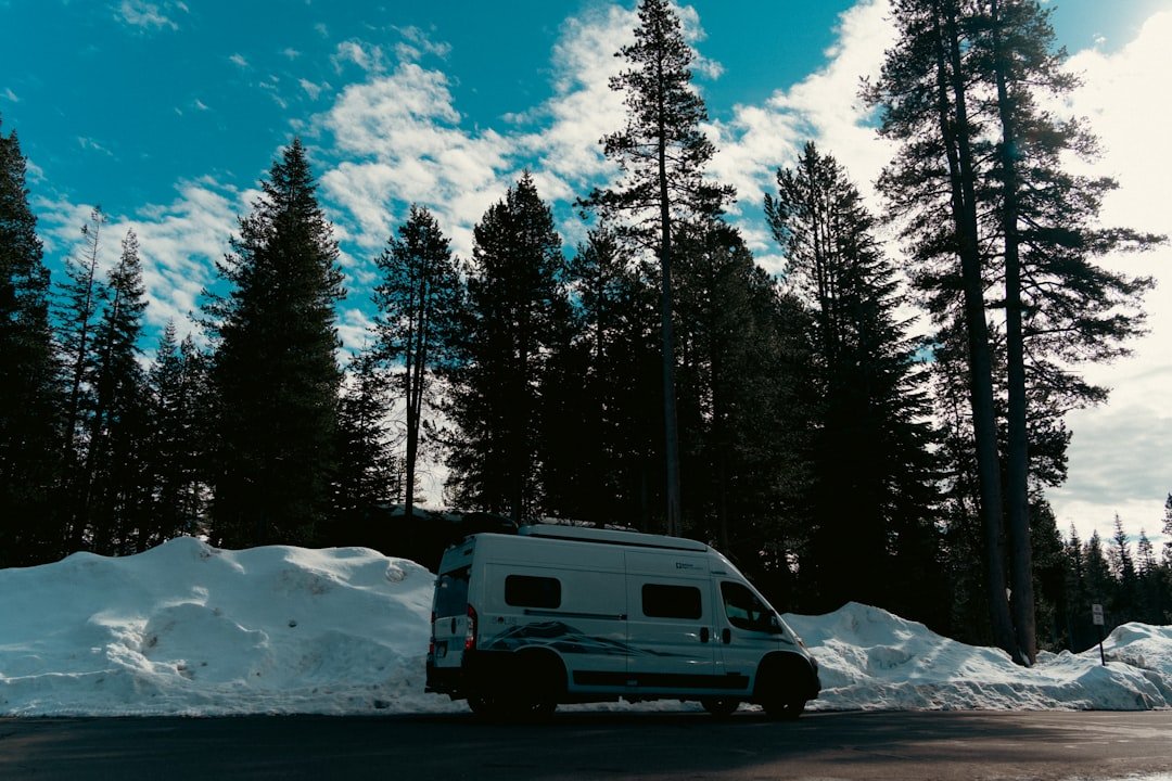 Van life winter camping in a snowy landscape