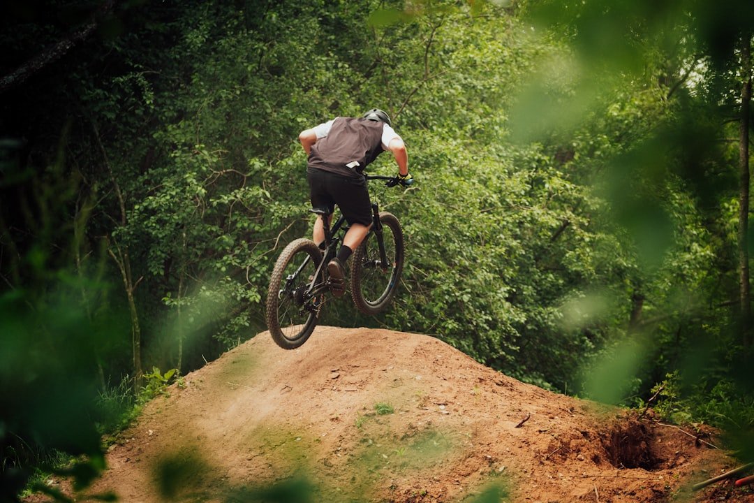 Mountain biking on a forest trail