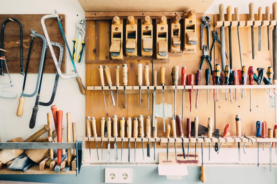 Van conversion workshop with tools and materials laid out for the build