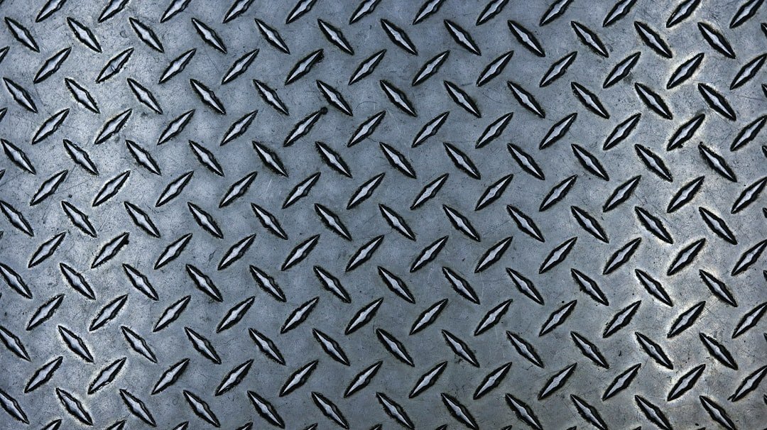 Close-up of corrugated metal flooring showing the ribbed surface typical in cargo vans