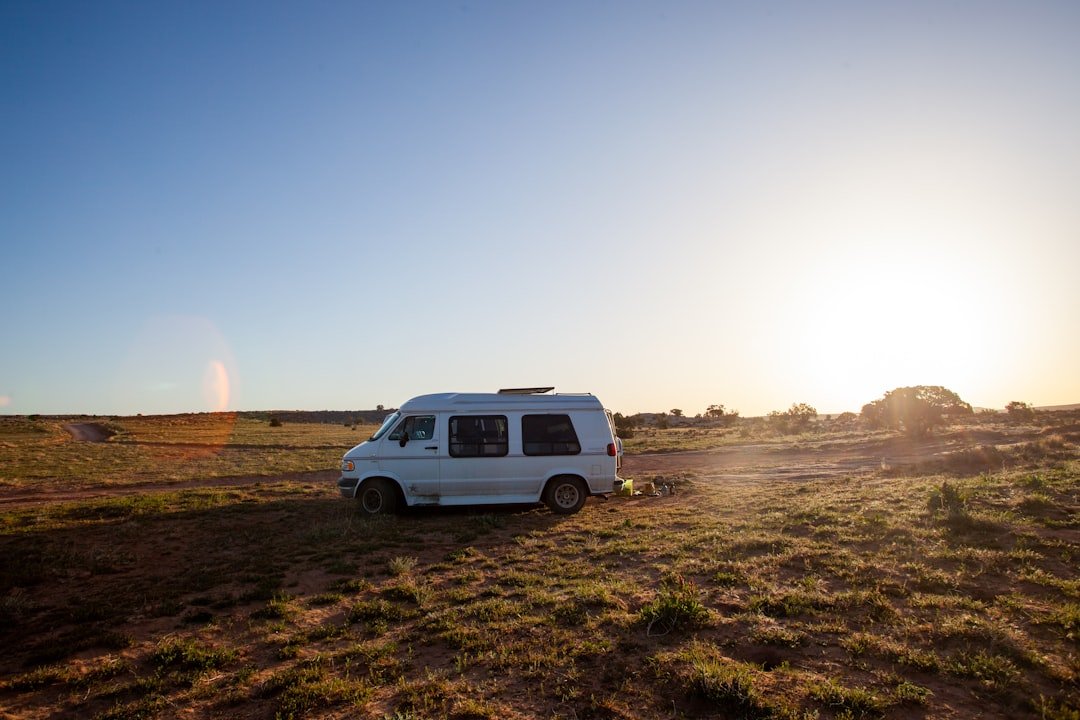 Campervan parked at a remote boondocking site at sunset