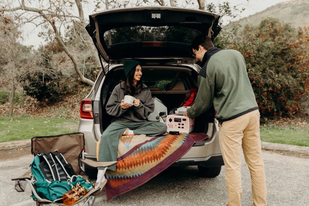 Road trip snacks and drinks spread out at a rest stop