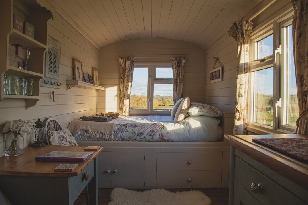 Cozy travel trailer interior with comfortable sleeping and living space