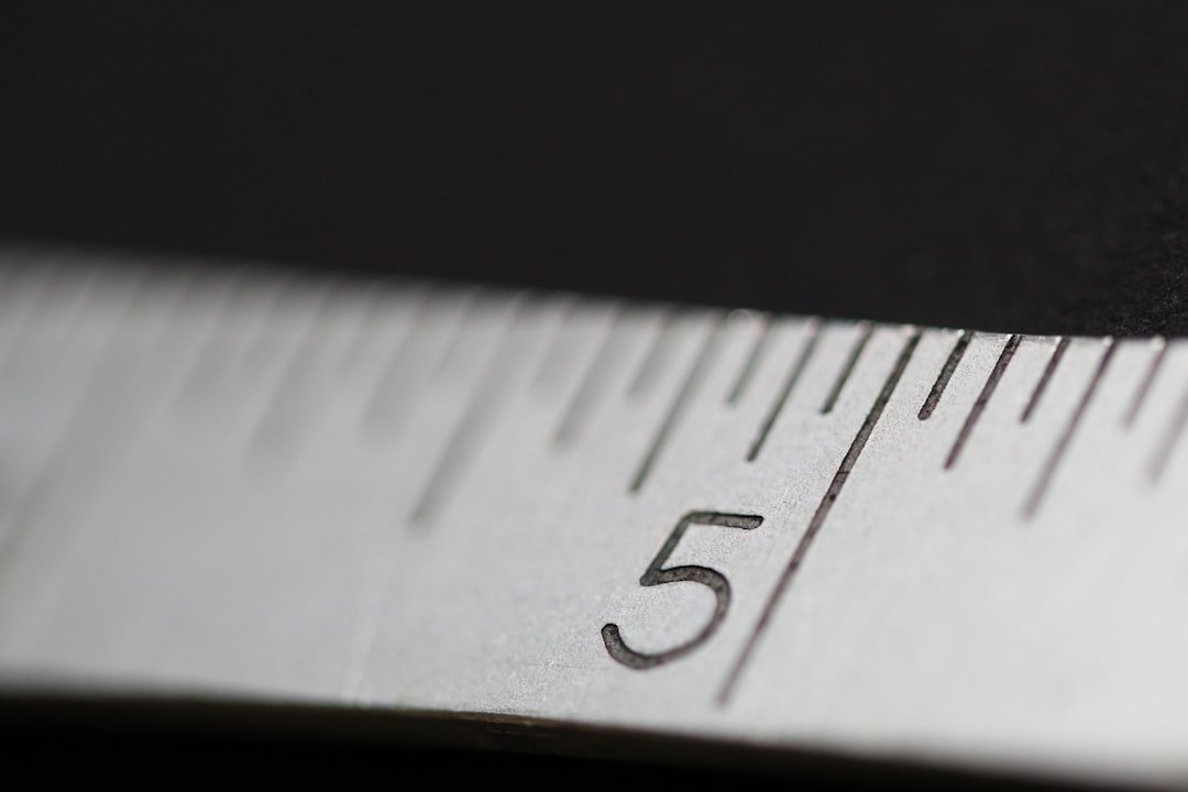 Precise measurements and template markings on metal surface for window cutout
