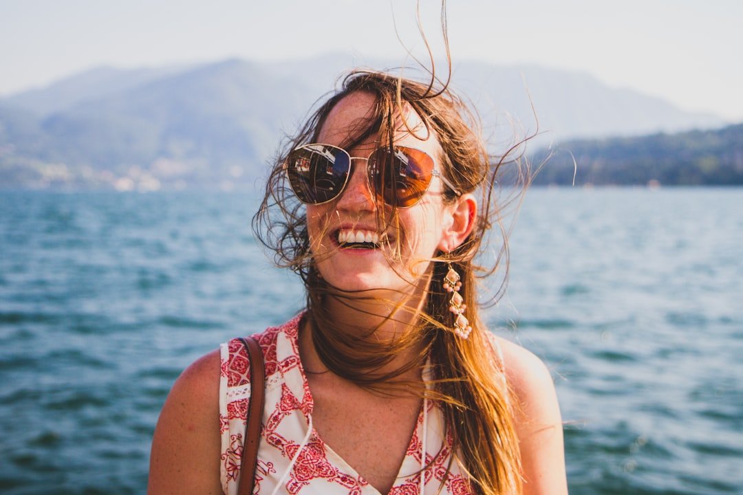 Sunglasses on a sunny day by the lake