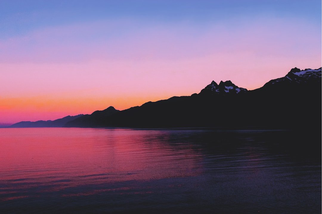 Sunset reflecting off mountain lake