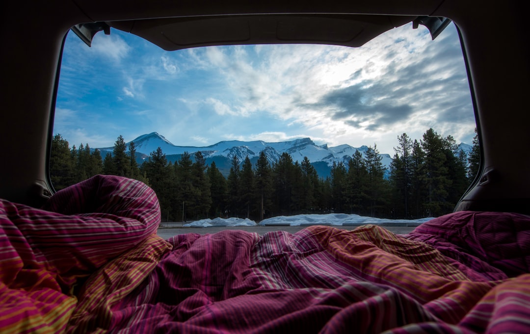 Truck bed camping mattress setup in the back of a pickup