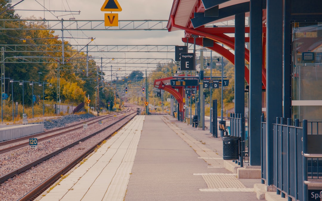 Train station platform with passengers boarding