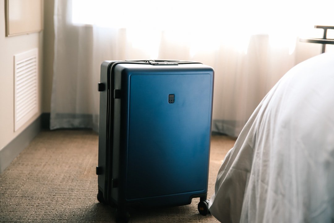 Traveler packing compression socks in hotel room