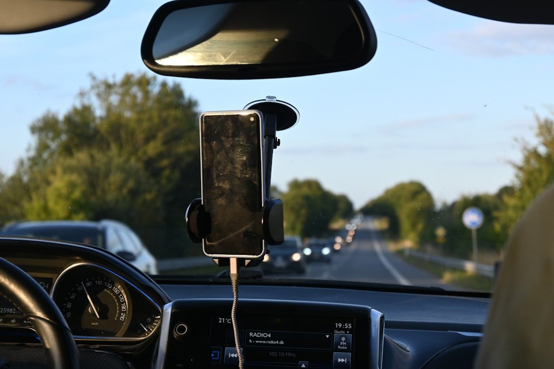 Car phone charger on road trip