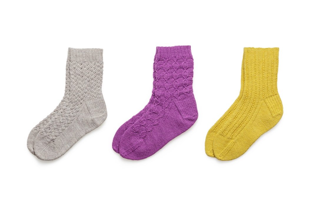 Close-up of colorful compression sock patterns