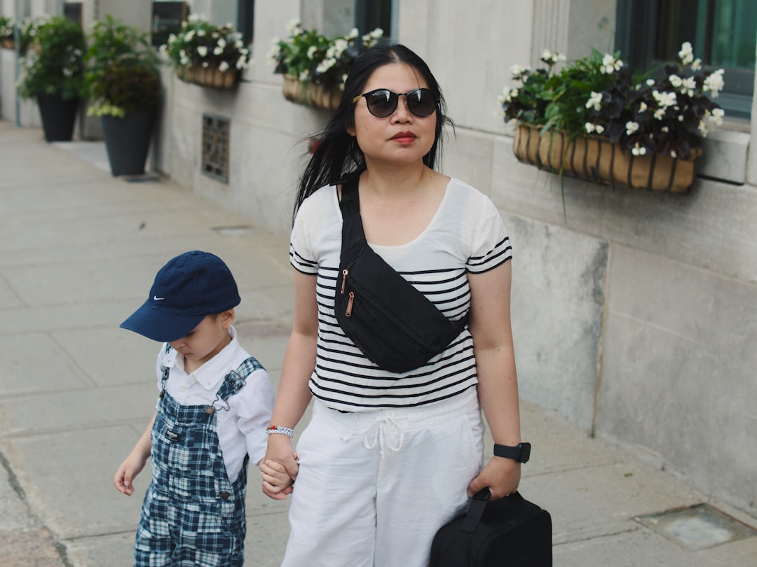Traveler wearing crossbody sling bag exploring city streets
