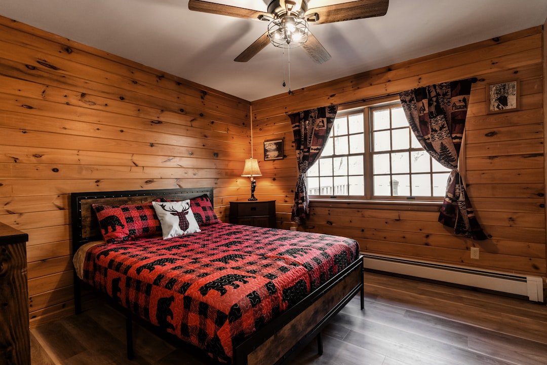 Rustic cabin bedroom with quilt bedding