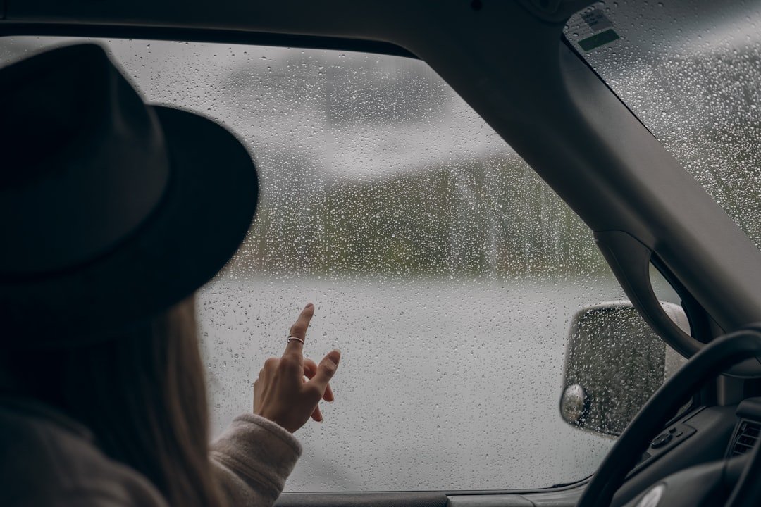 Rain falling on a campervan window