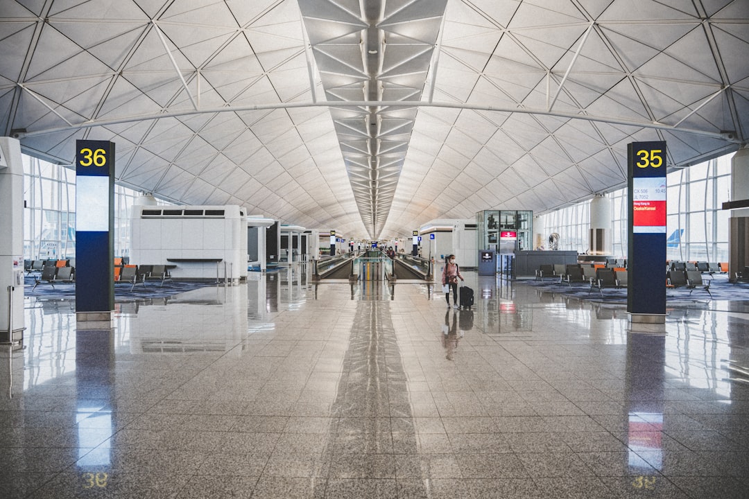 Carry-on luggage at airport terminal ready for departure