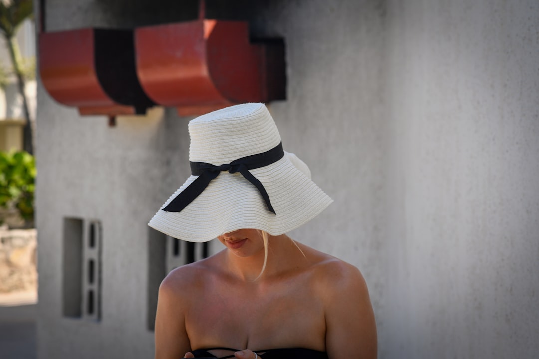 Traveler wearing sun protection clothing on outdoor adventure