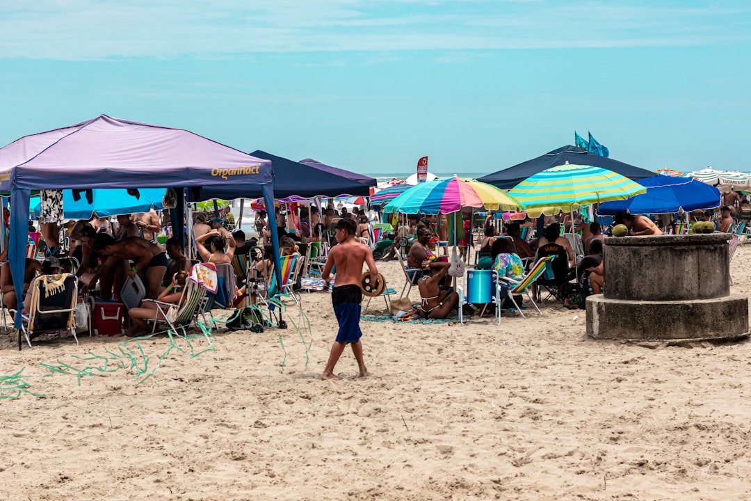 Beach cooler with ice and drinks by the ocean