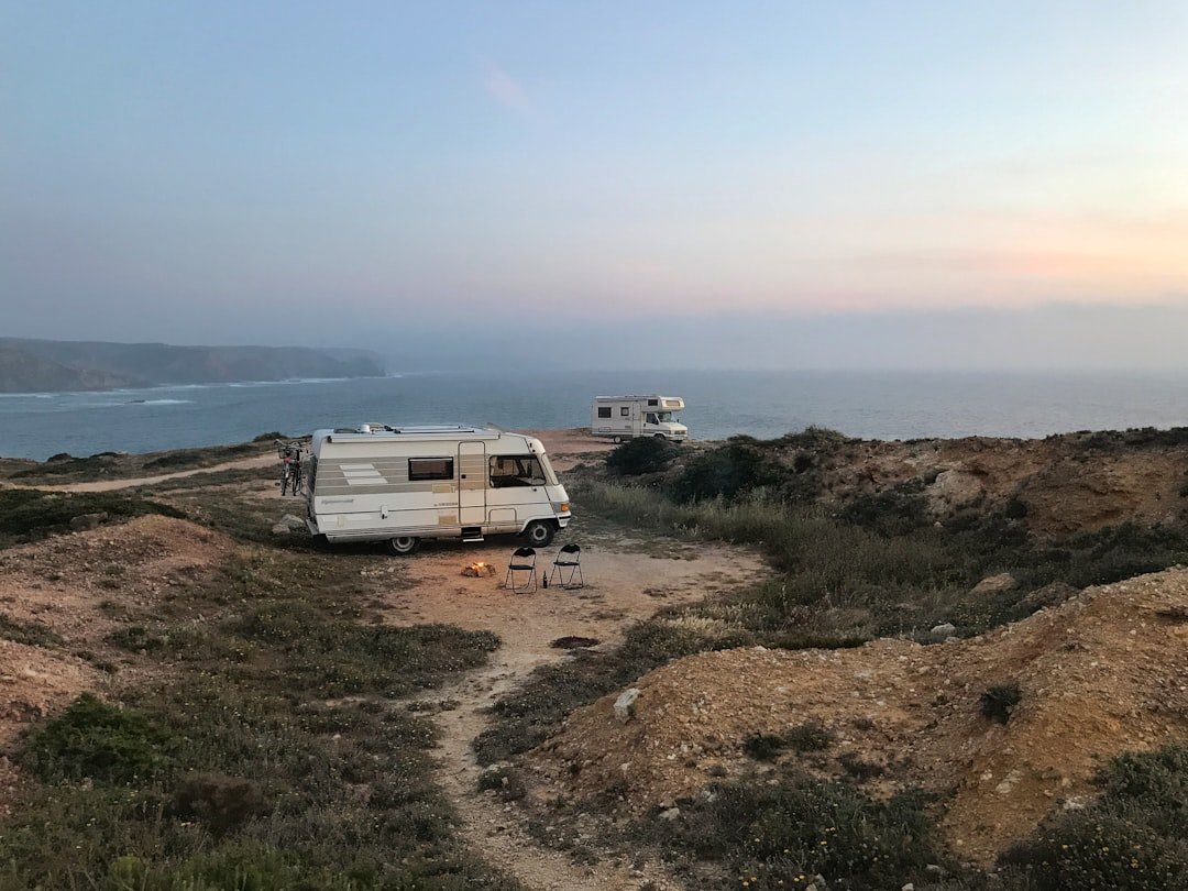 Campervan parked at a dispersed camping spot at sunset