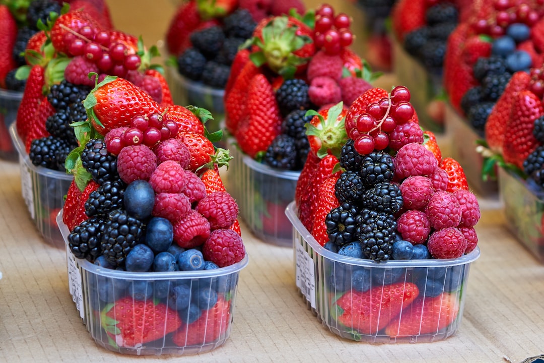 Fresh fruit and berries in a bowl for road trip snacking