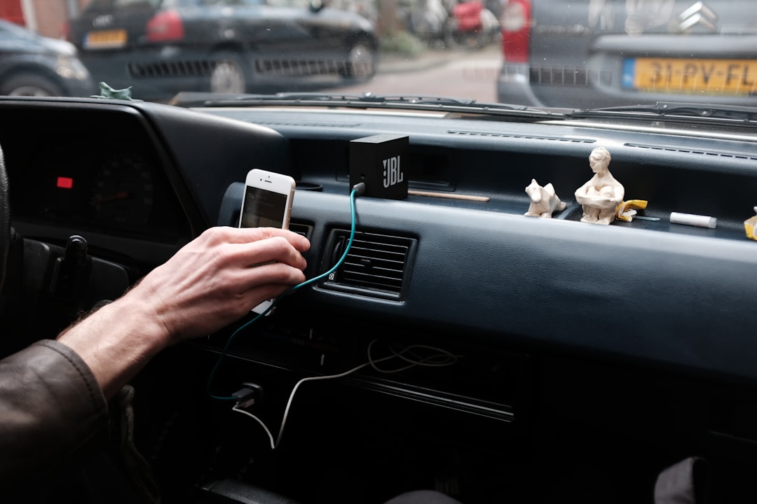 Phone charging in car dashboard mount