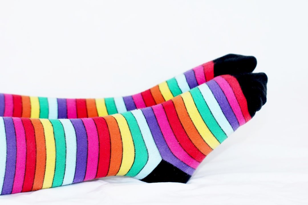 Colorful compression socks laid out for travel