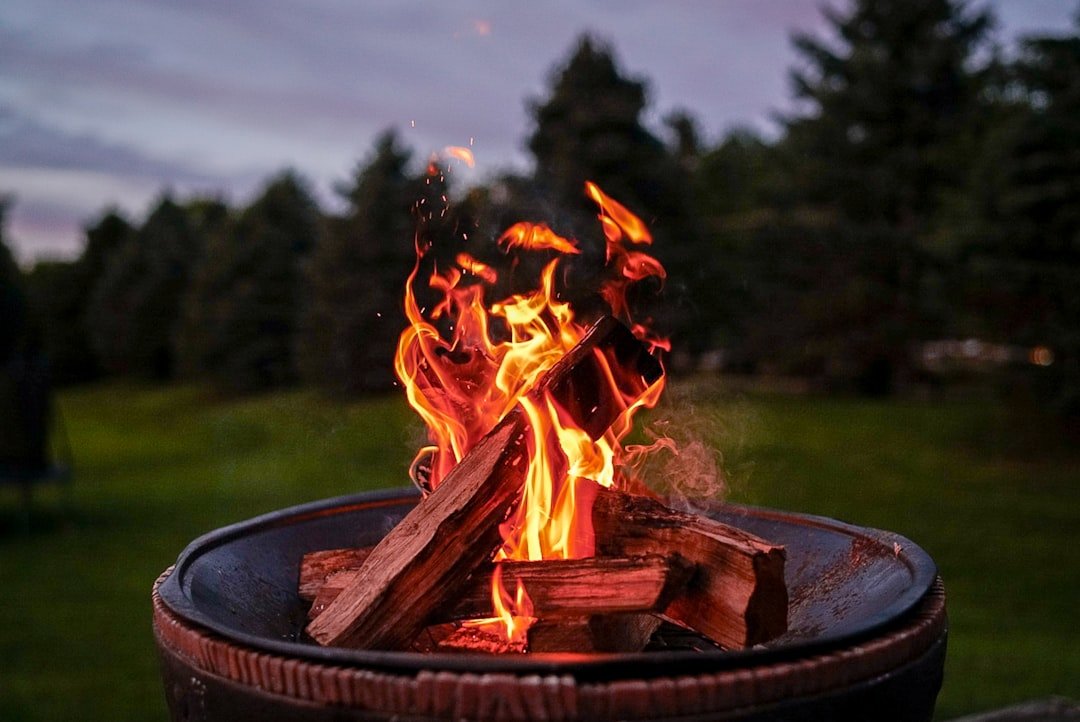 Campfire burning at sunset in the outdoors