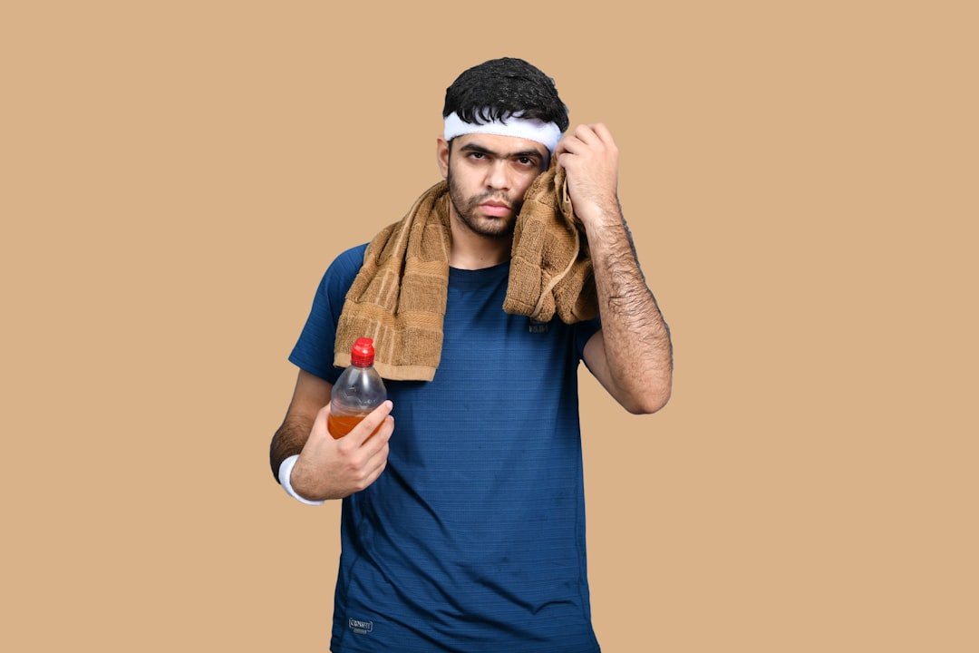 Cooling towel draped around neck during outdoor sports activity