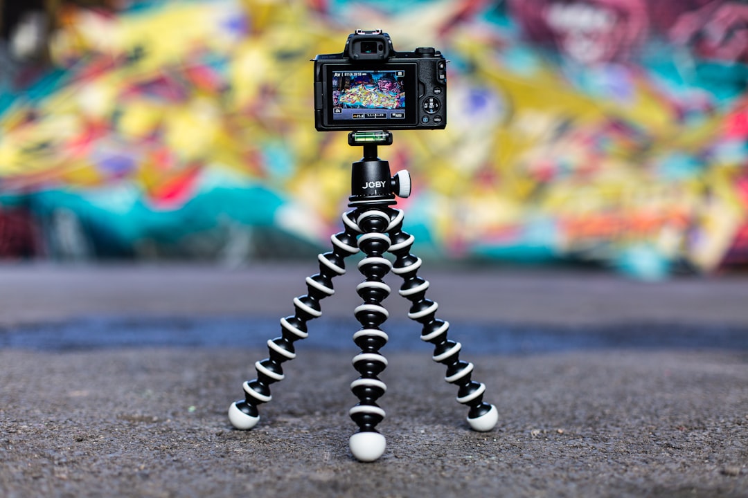 Flexible gorilla-style tripod wrapped around a railing
