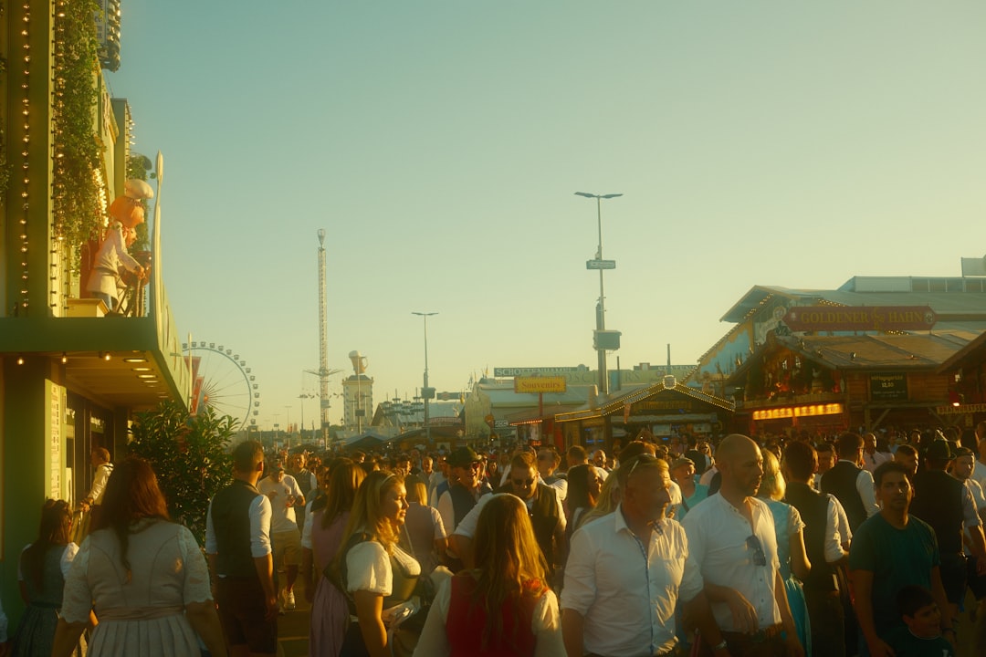 Fairground crowd at sunset