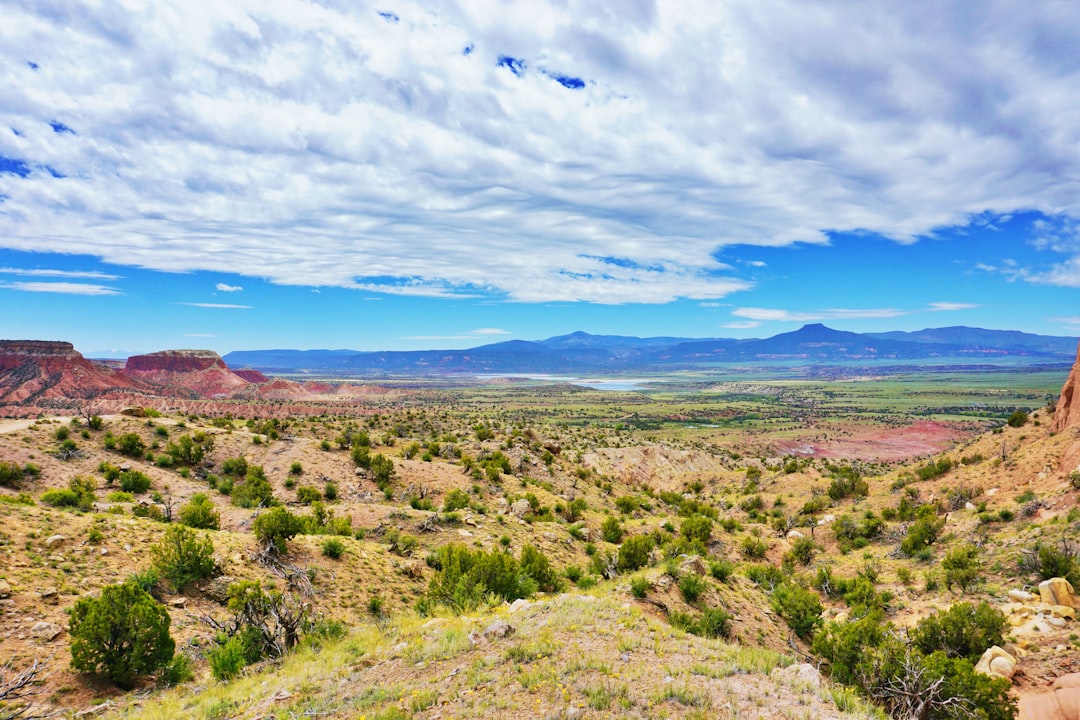 Wide open mesa landscape near Eagle Nest with mountain ranges in the distance
