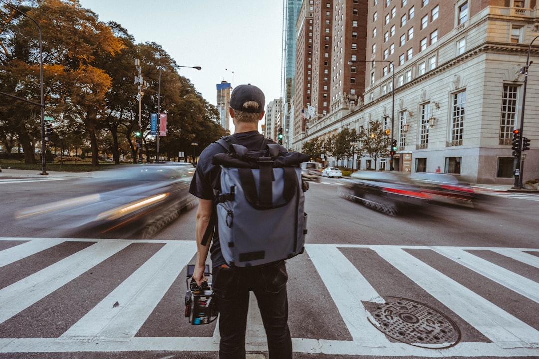 Secure travel backpack worn while navigating a busy city