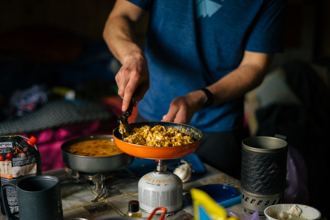 Cooking a meal in a campervan kitchen