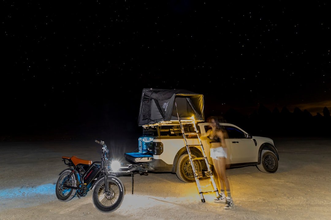Portable camping toilet set up at an outdoor campsite